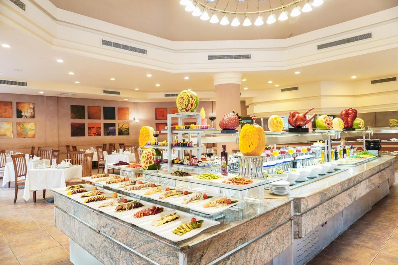 Готель Charmillion Gardens Aquapark Шарм-еш-Шейх Екстер'єр фото A buffet at a hotel